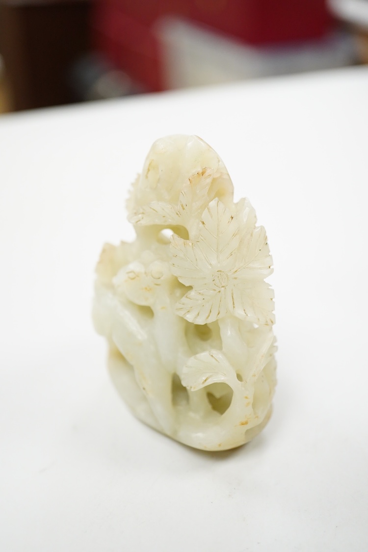 A Chinese pale celadon jade 'deer' pebble carving, 7cm high